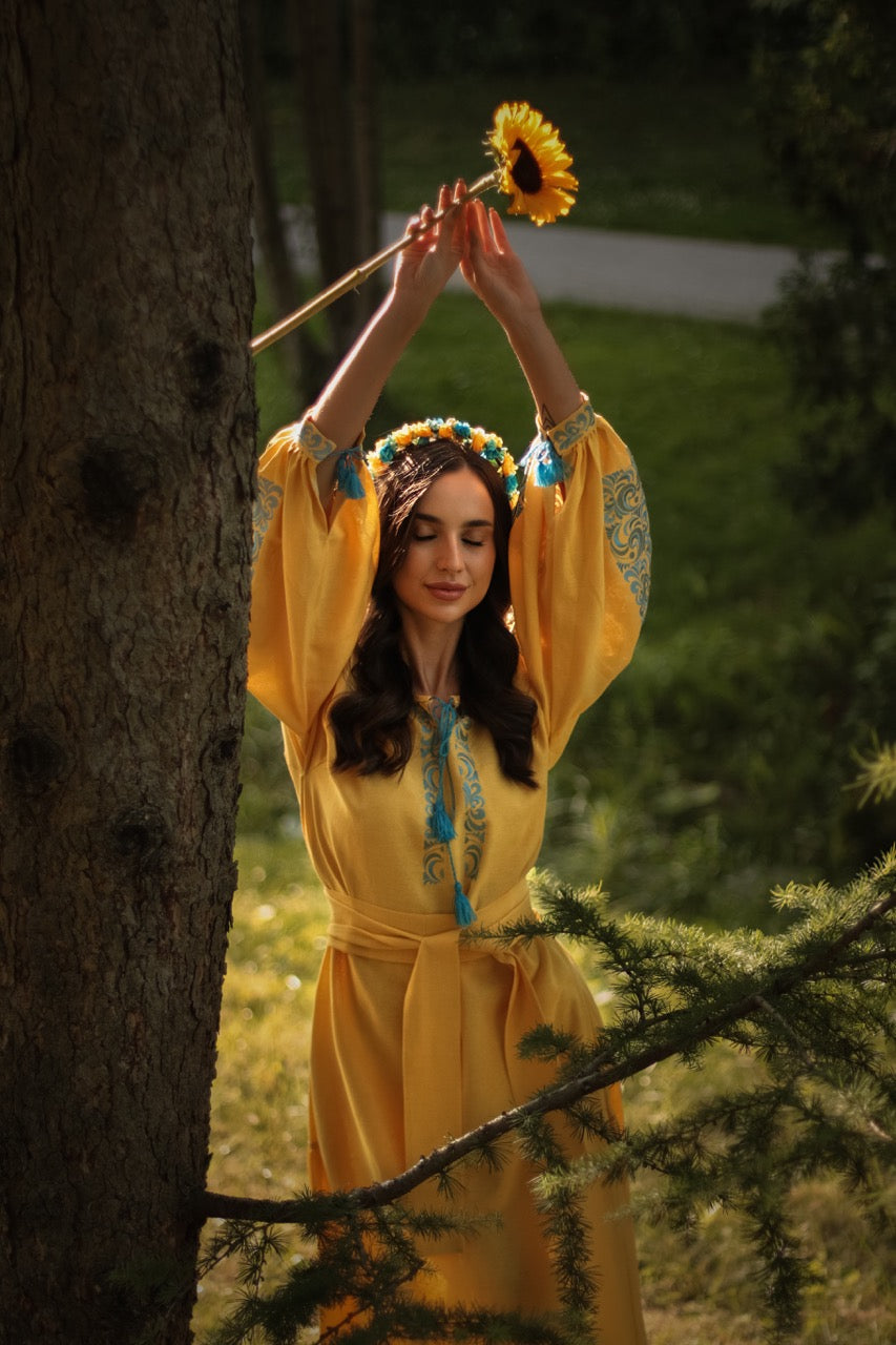 The Long Yellow Dress with Blue Embroidery