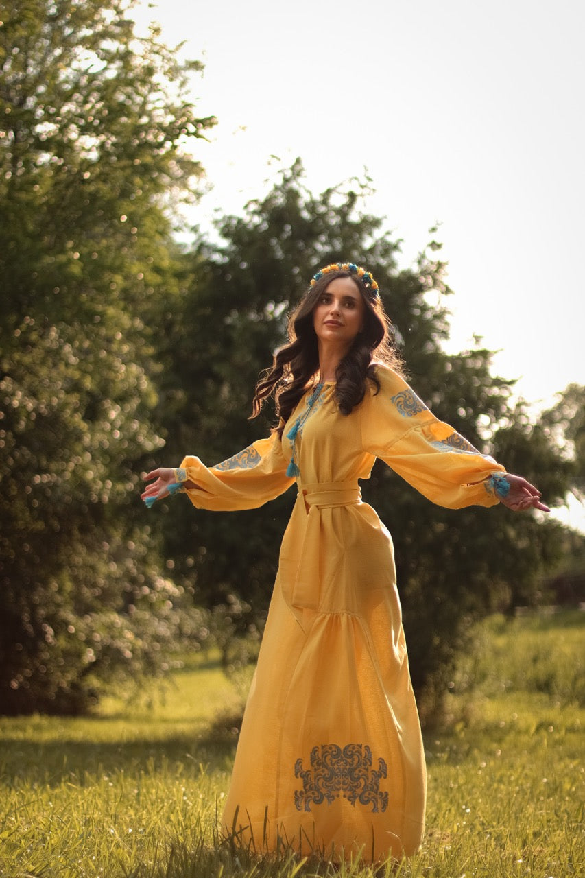 The Long Yellow Dress with Blue Embroidery