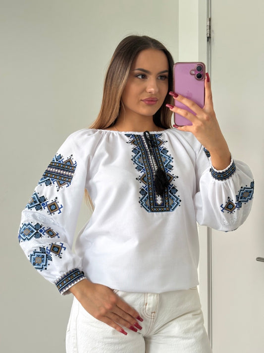 White Blouse with Blue Embroidery