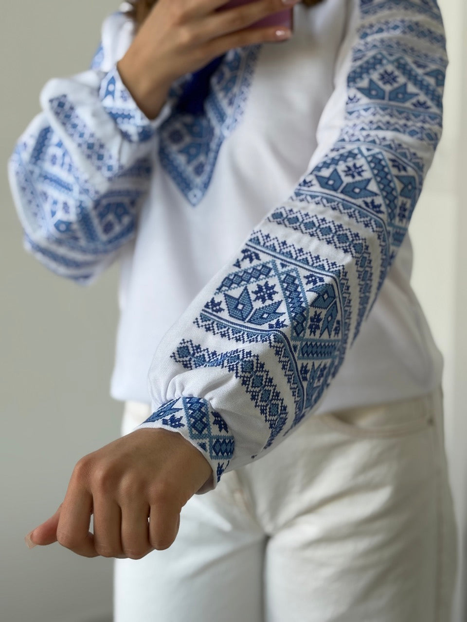 White Blouse with Blue Embroidery