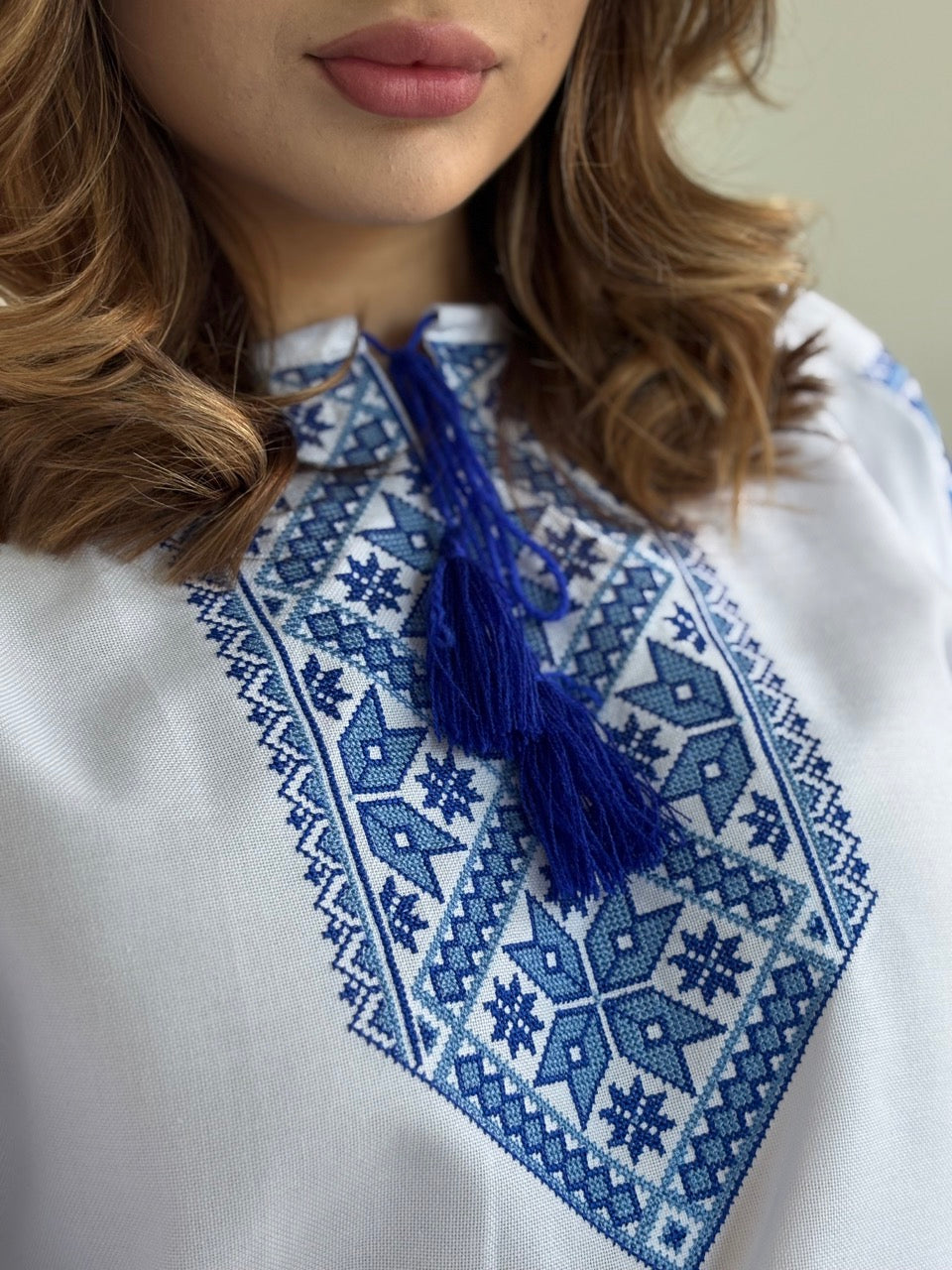 White Blouse with Blue Embroidery