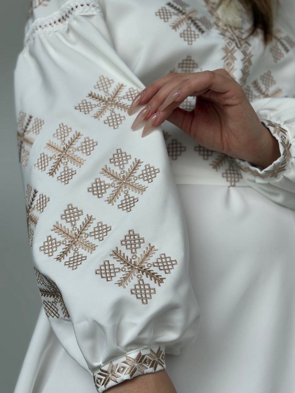White Dress with Golden Embroidery and a side slit