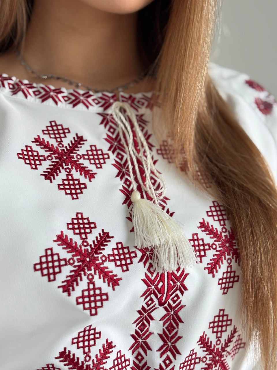 White Dress with Red Embroidery and a side slit