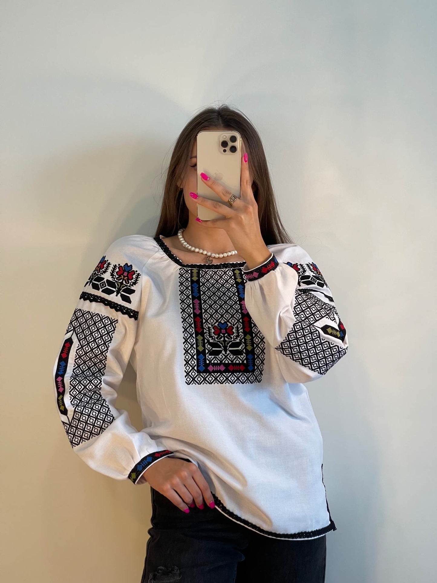 The White Women's Blouse with Geometric Embroidery