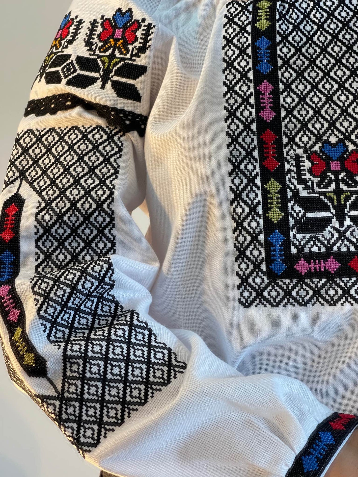 The White Women's Blouse with Geometric Embroidery