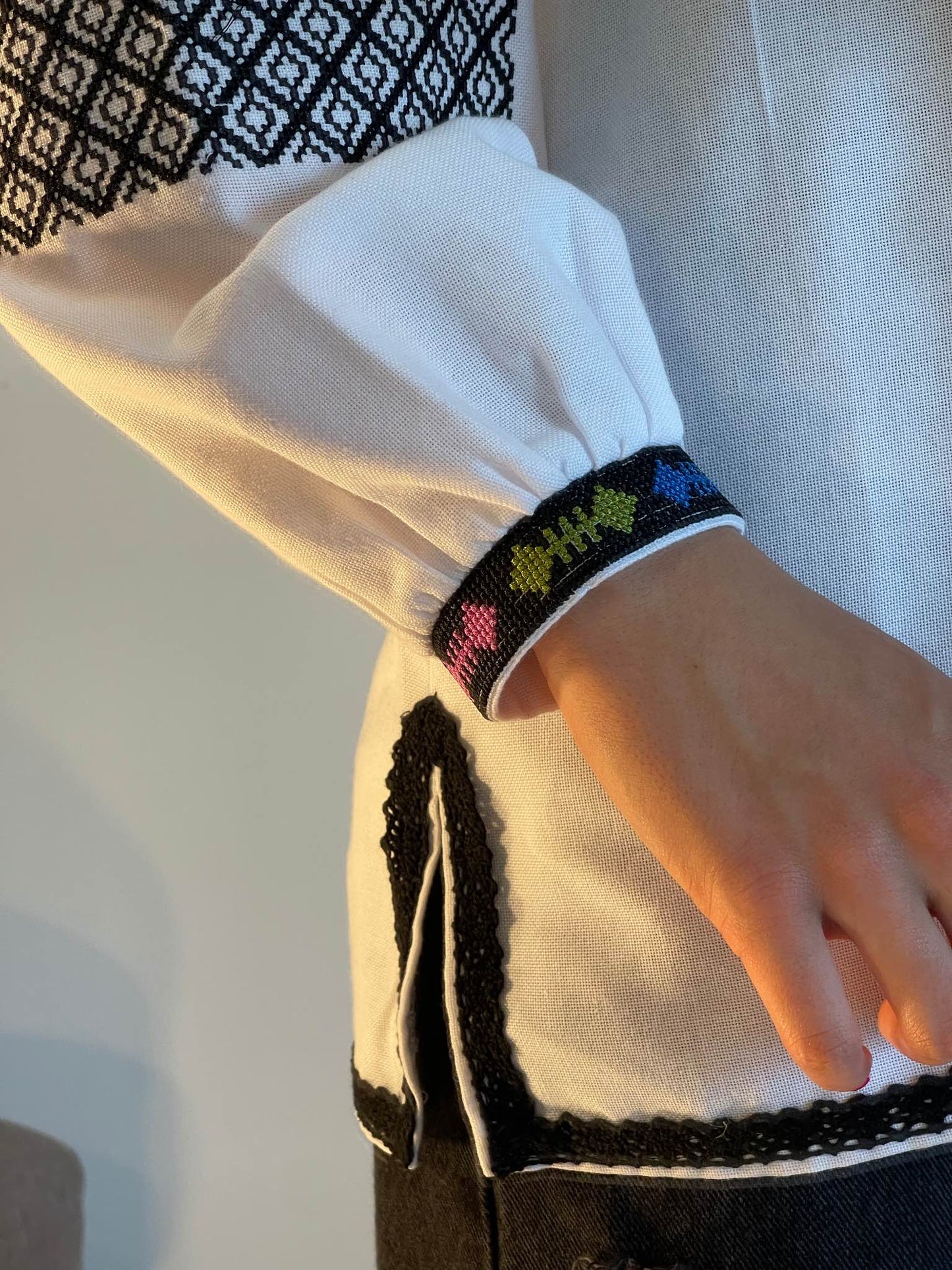 The White Women's Blouse with Geometric Embroidery