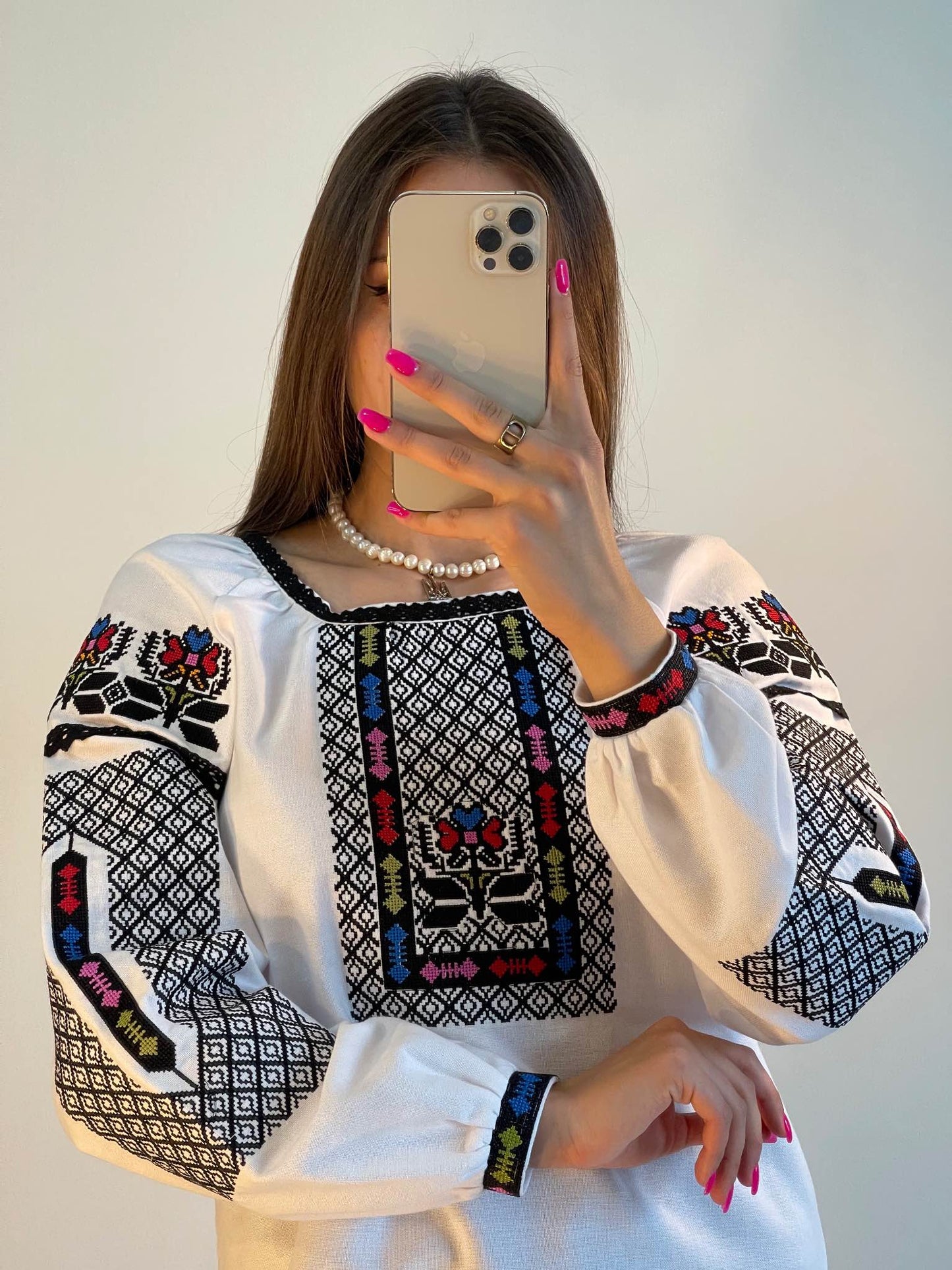 The White Women's Blouse with Geometric Embroidery