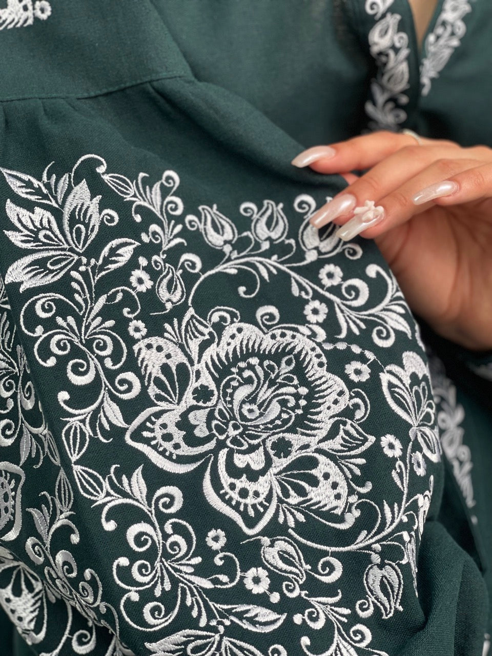The Green Dress with White Embroidery