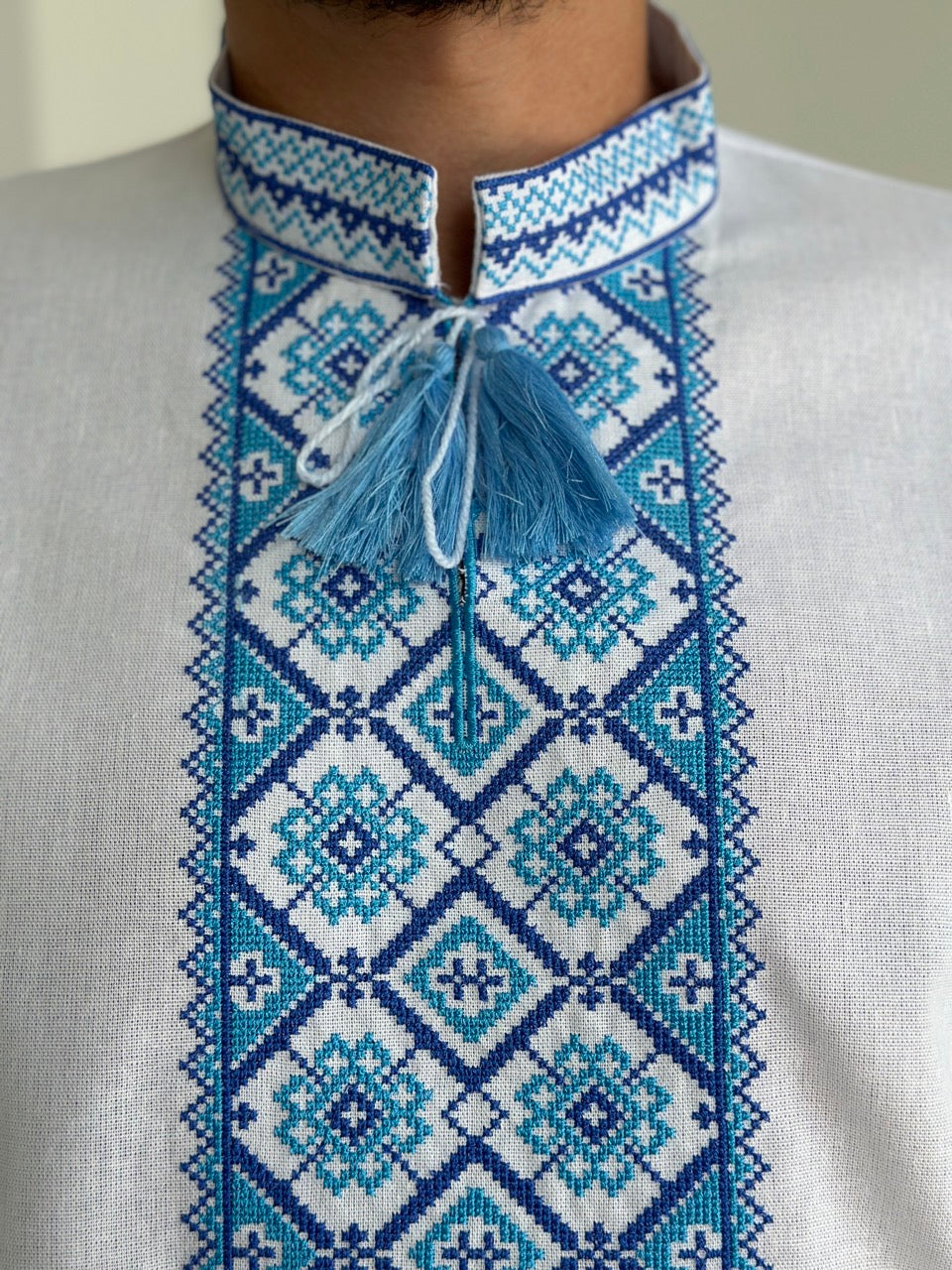 White Men's Vyshyvanka with Short Sleeves and Blue Embroidery