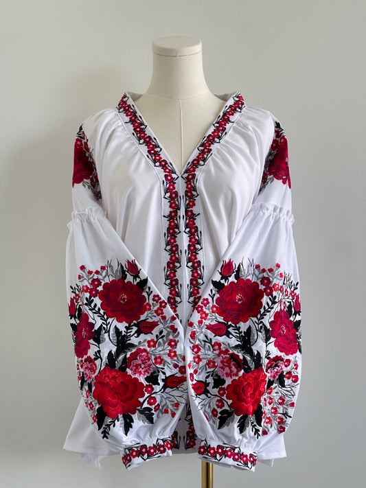 The White Embroidered Blouse with Red Flowers