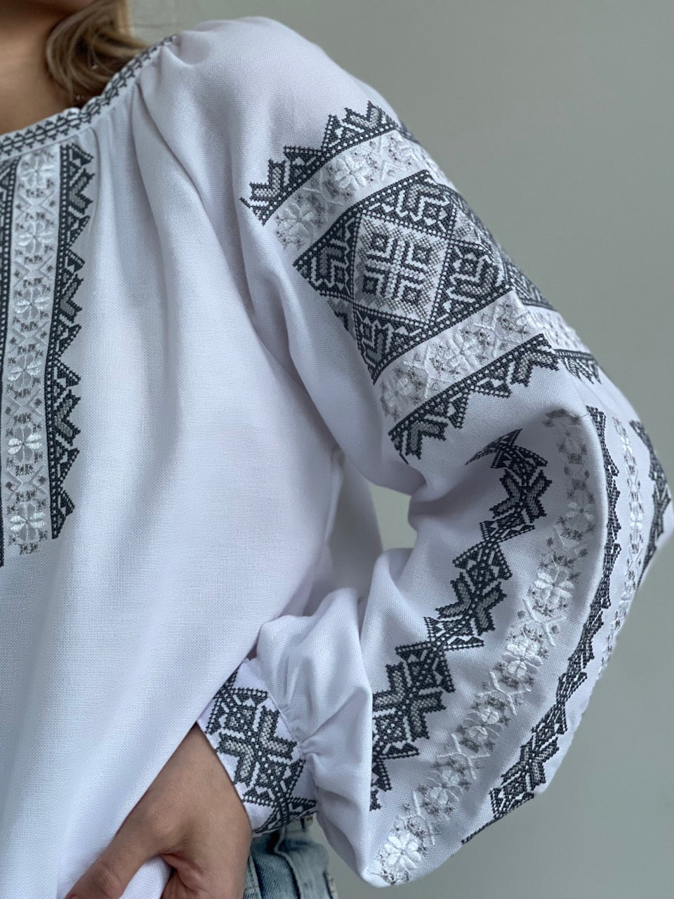 The White Blouse with Grey Embroidery