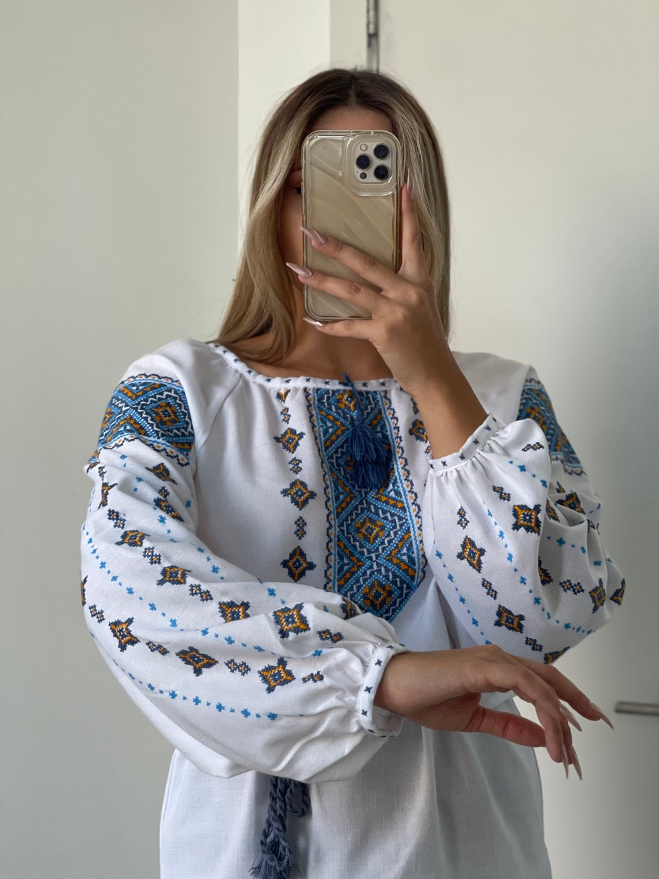 The Elegant White Blouse with Ukrainian Hand Embroidery