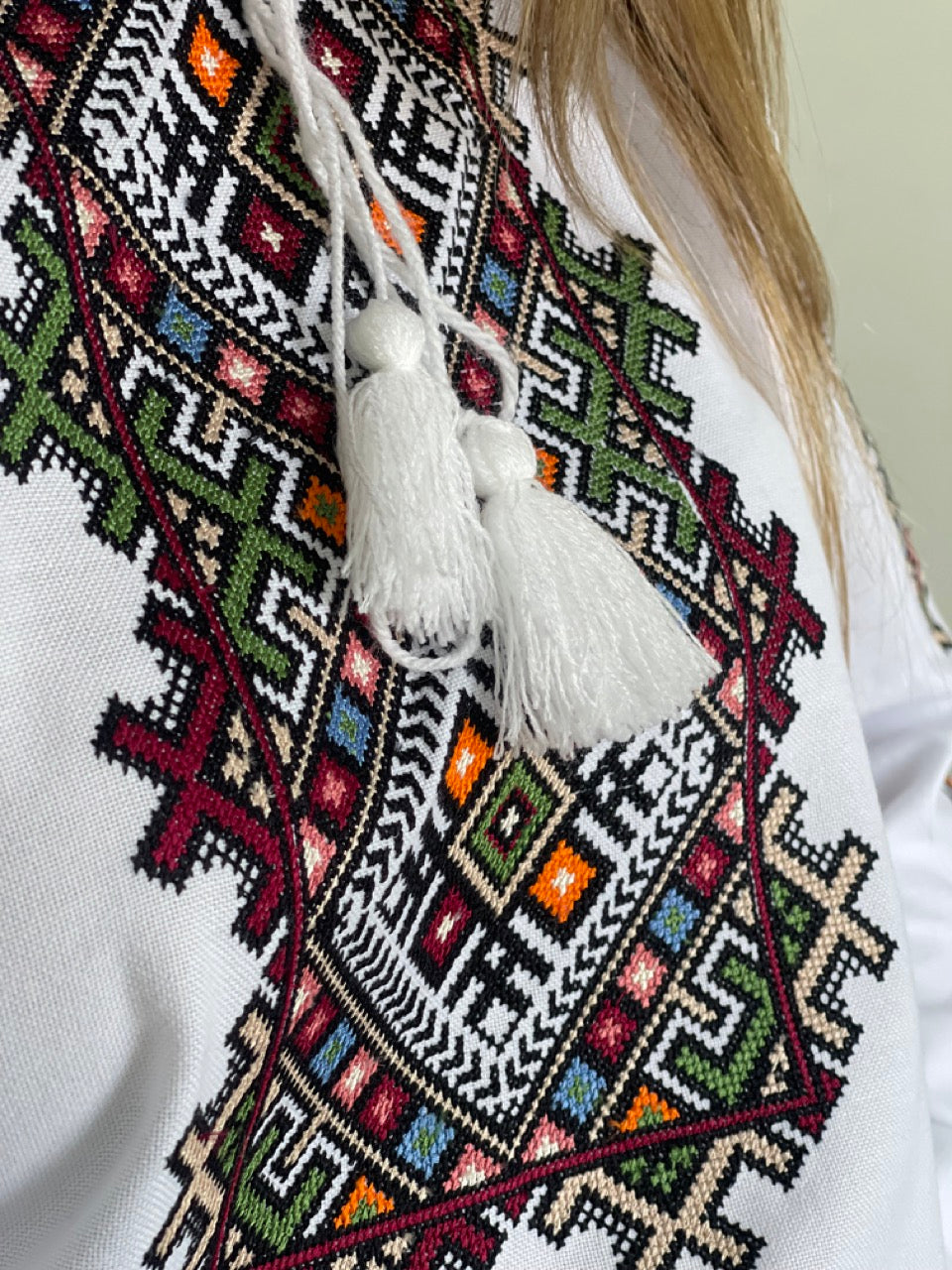 The White Women's Blouse with Colourful Embroidery