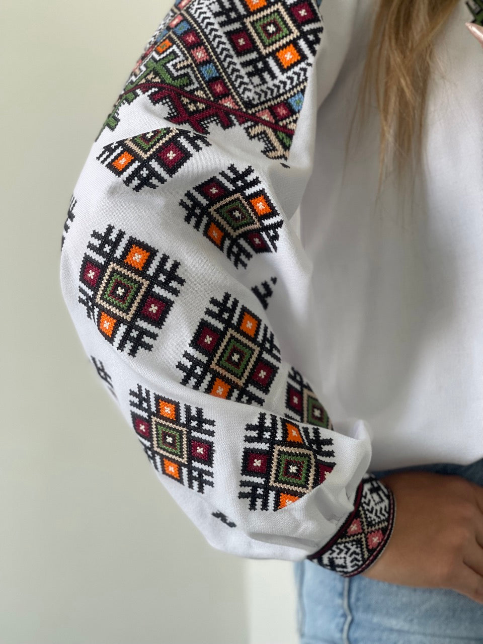 The White Women's Blouse with Colourful Embroidery