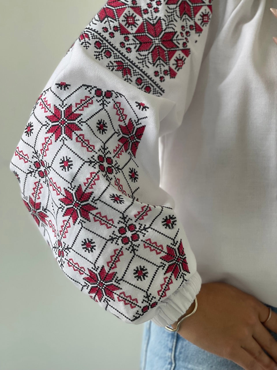 The White Women's Blouse with Red and Black Embroidery