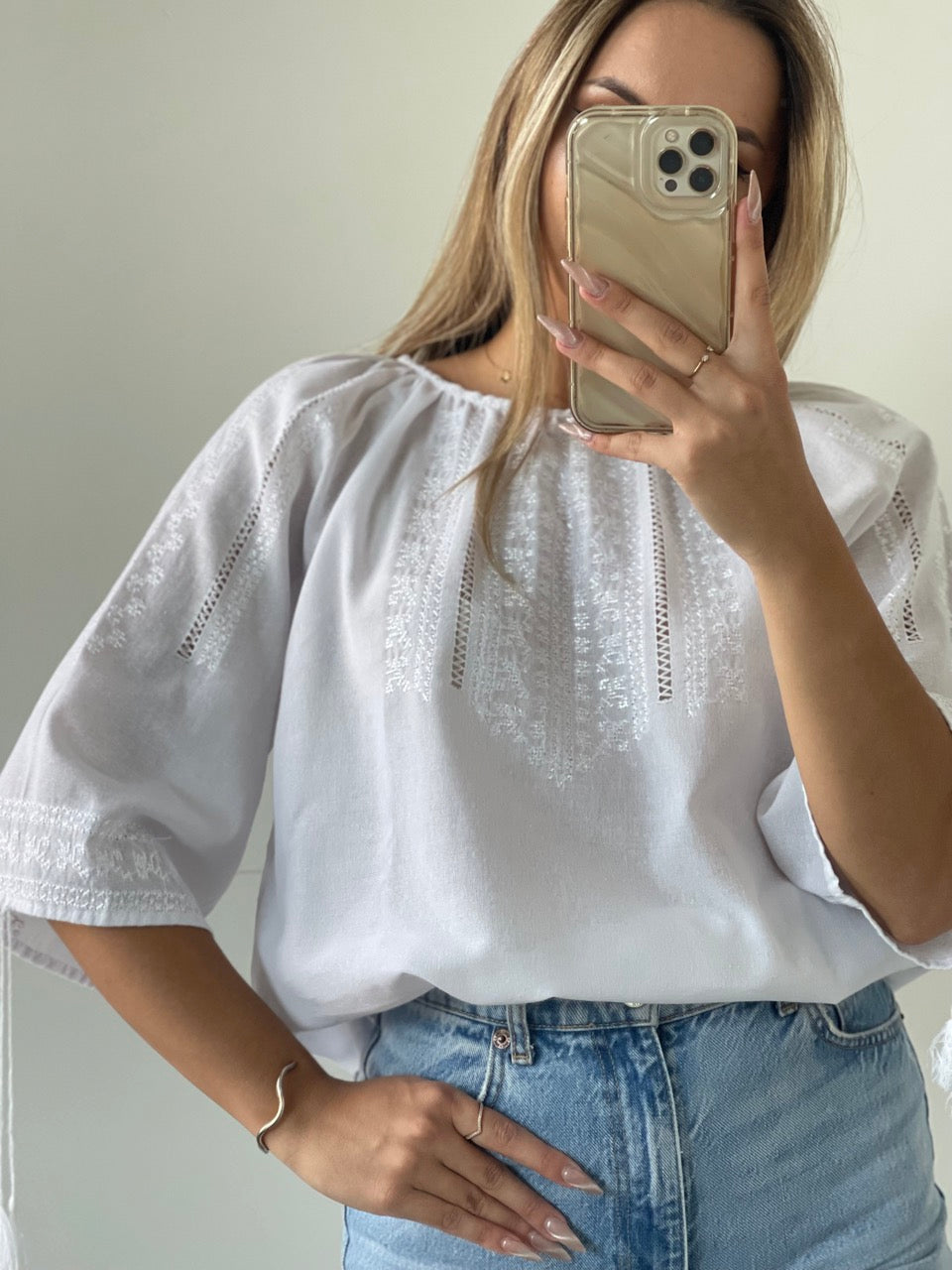 The White Blouse with White Hand Embroidery