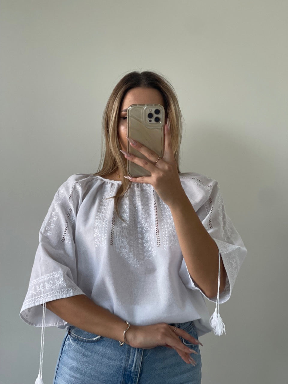 The White Blouse with White Hand Embroidery