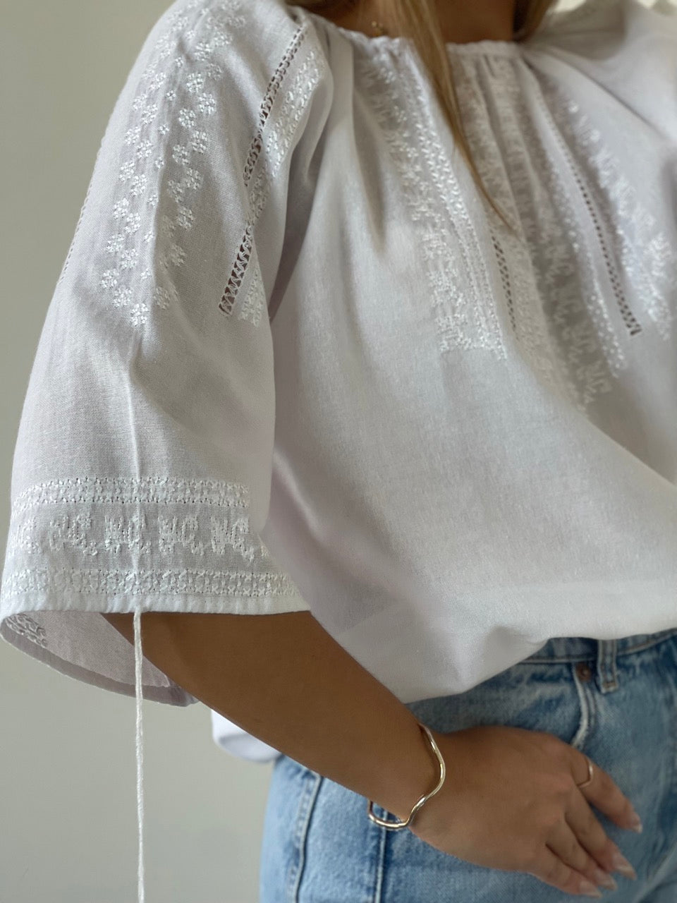 The White Blouse with White Hand Embroidery