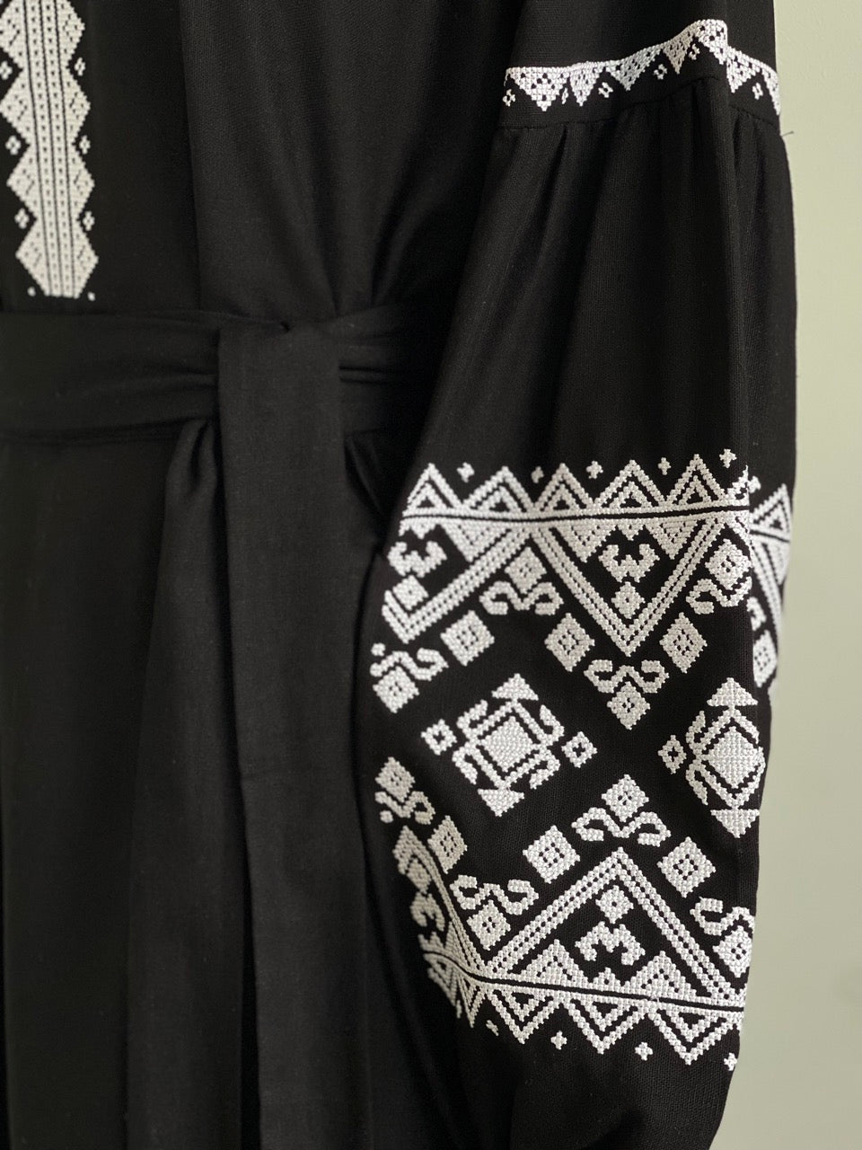 The Black Dress with White Embroidery